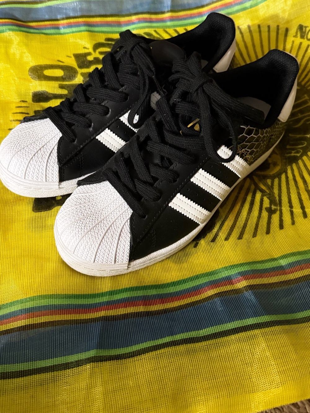 Adidas Superstar black and white shoes with a snake skin pattern women’s size 6